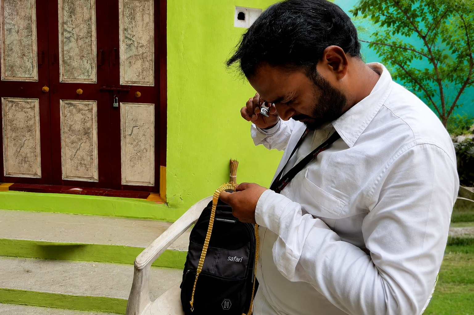 Gold purity inspection conducted by an expert before determining the best cash value