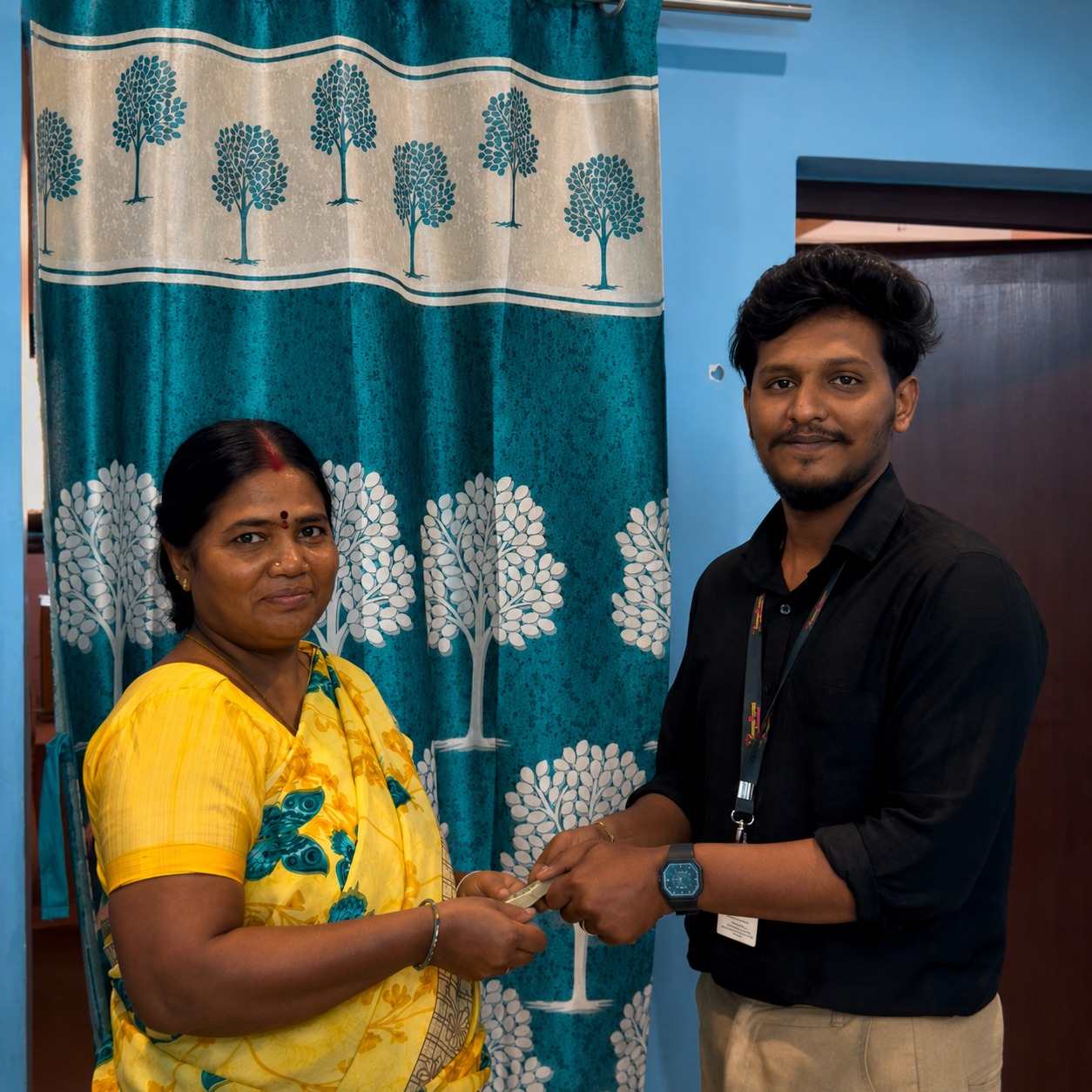Happy customer receiving cash after gold valuation